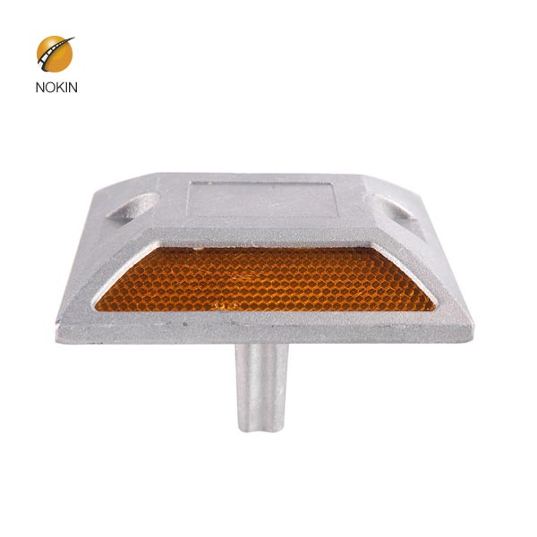 On which part of a motorway are amber reflective studs found 